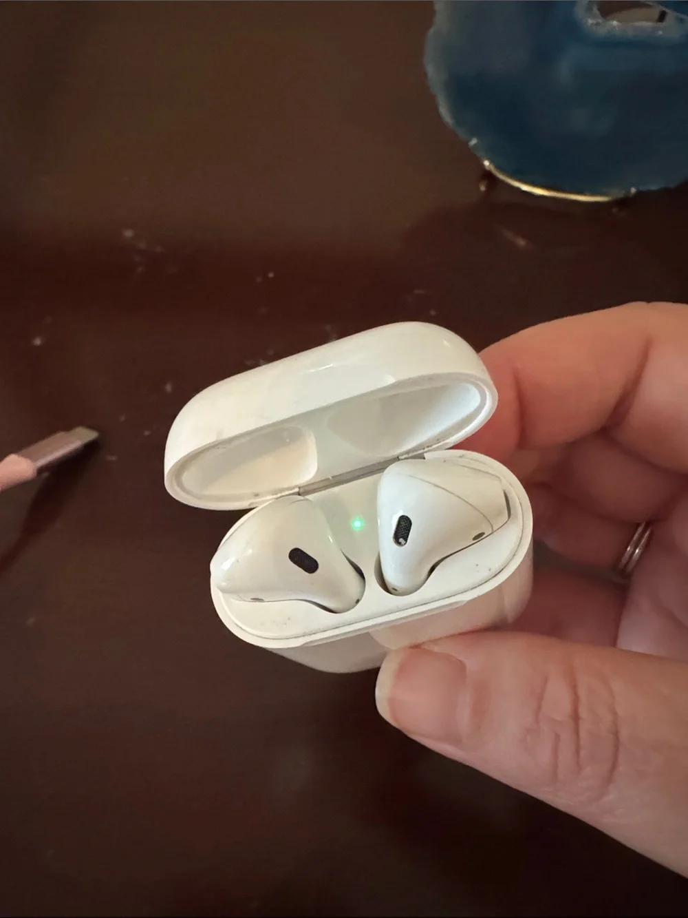 Apple AirPods 1st Generation + Pink Lightning Charging Cable with Cow Print Case